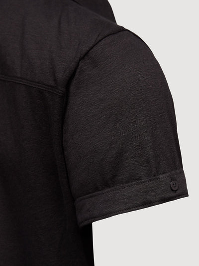 Madeira French Linen Short Sleeve Polo in *Berlin Black* (black) — sleeve cuffed detail | Y.Chroma