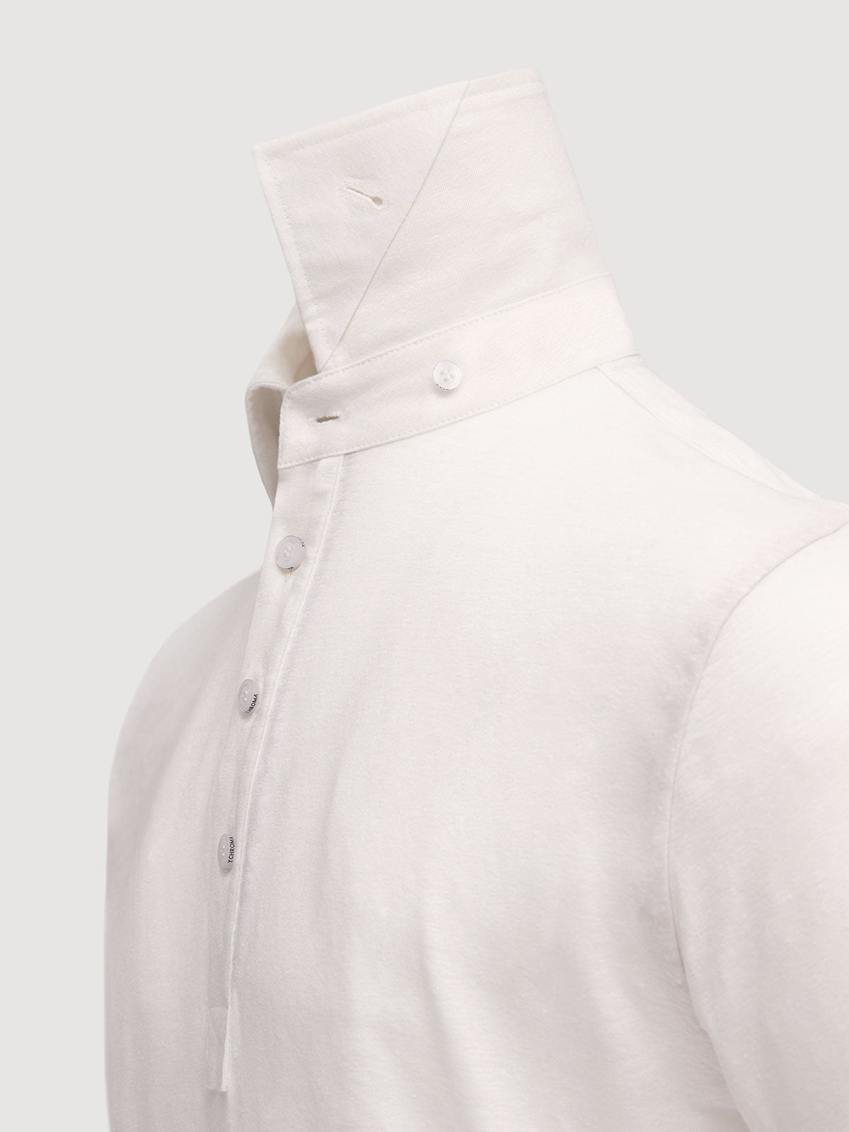 Madeira French Linen Short Sleeve Polo in *White Lotus* (off-white) — collar button system detail | Y.Chroma