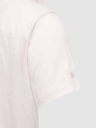 Madeira French Linen Short Sleeve Polo in *White Lotus* (off-white) — sleeve uncuffed detail | Y.Chroma
