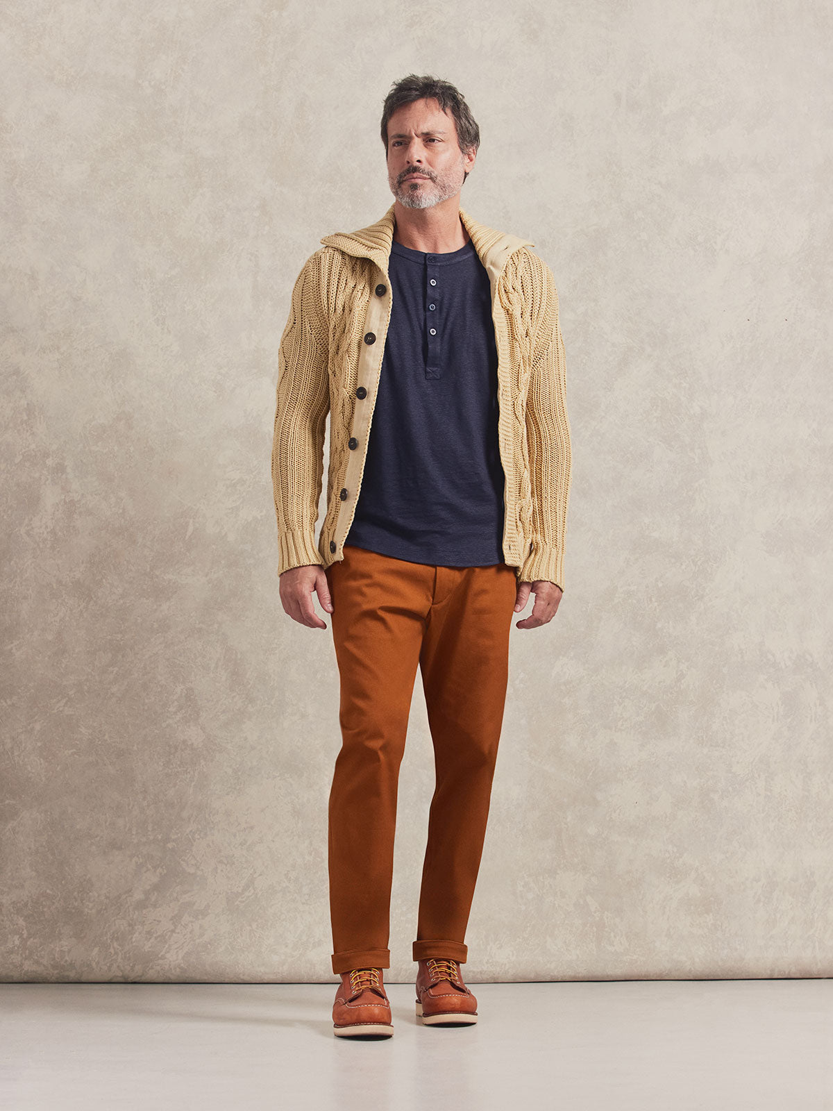French Linen Short Sleeve Henley in *Midnight Blue* (navy blue) styled with Caramel Café Becker Pant and Soybean Power Cable Sweater — full length lookbook | Y.Chroma