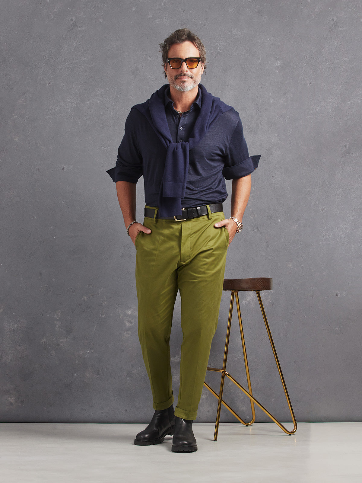 Madeira French Linen Long Sleeve Polo in *Midnight Blue* (navy blue) styled with Military Olive Becker Pant and Midnight Blue Dwayne V-Neck Cashmere Sweater on top of shoulders— full length lookbook | Y.Chroma