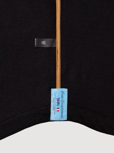 Madeira French Linen Short Sleeve Polo in *Berlin Black* (black) — French linen label detail | Y.Chroma